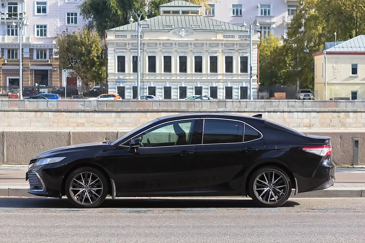 Black sedan, side view